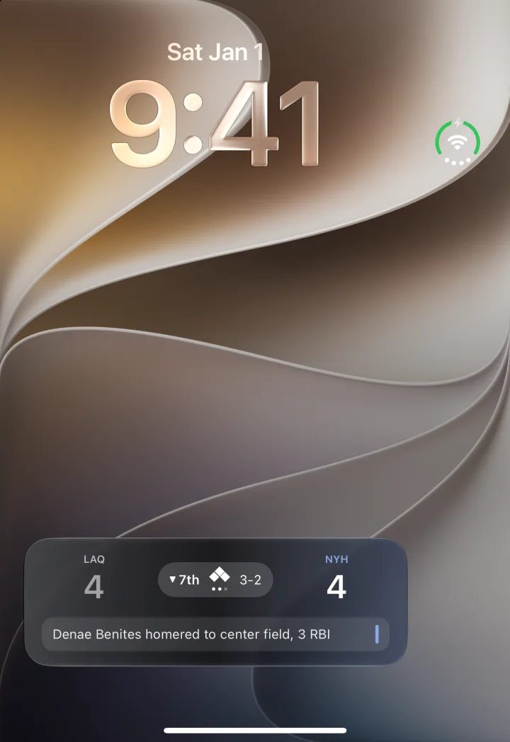 The iPhone Duo Lock Screen with a Peach Live Activity showing Los Angeles and New York tied 4 to 4 in the bottom of the seventh, a 3-2 count, and the last play: Denae Benites homered to center field, 3 RBI.